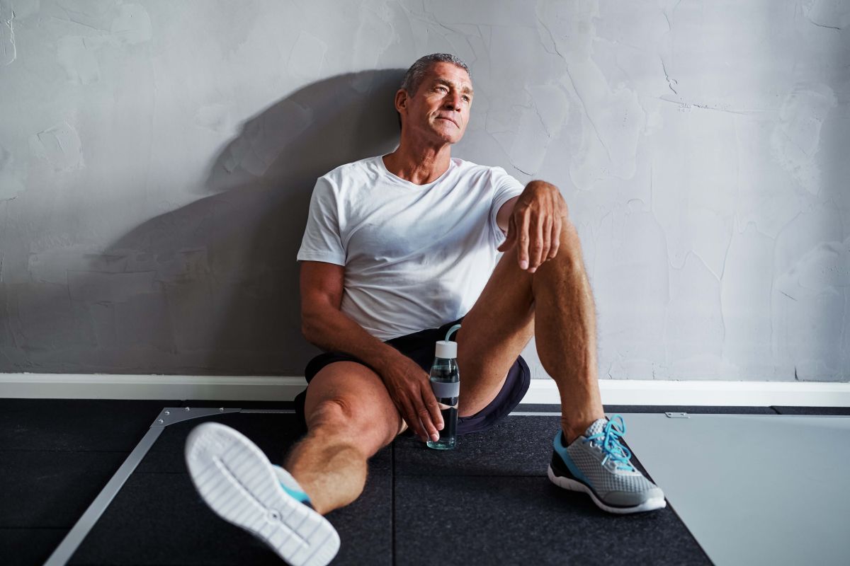 Exhausted senior man relaxing after a health club 2023 11 27 05 17 55 utc