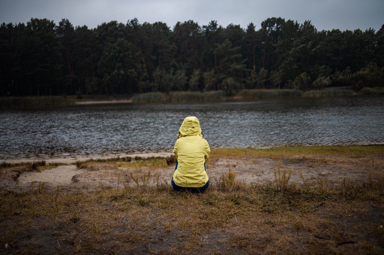 Lonely sad woman in yellow raincoat in forest unde 2023 11 27 05 20 34 utc large