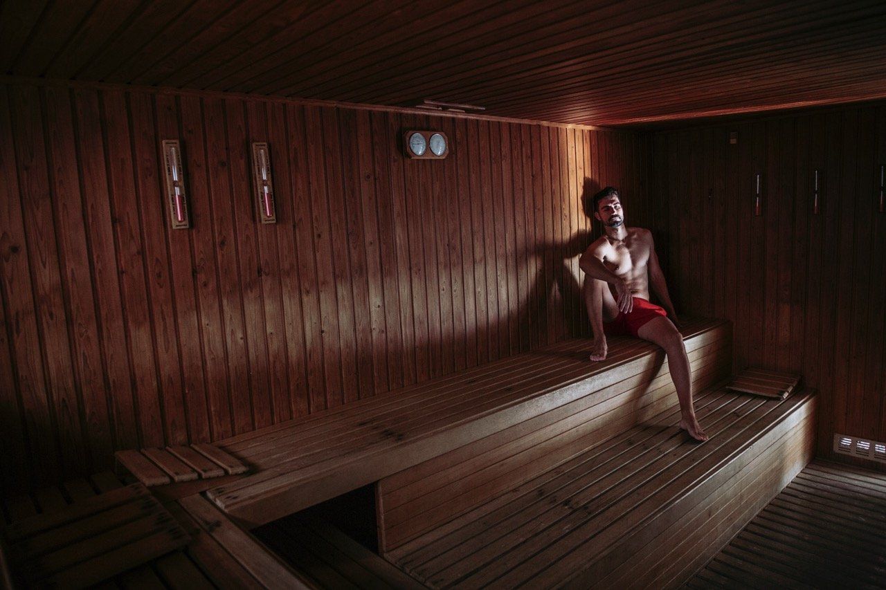 Man relaxing in a sauna 2023 11 27 04 56 59 utc large